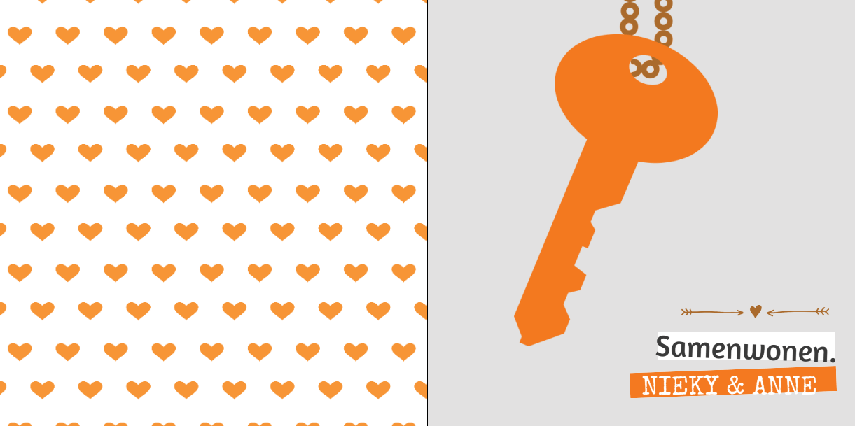 Oranje sleutel op grijs.